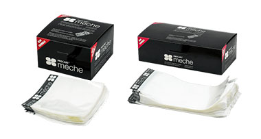 Two boxes of Meche hair color processing strips, one black box on the left and one black box on the right, with the strips displayed in front.