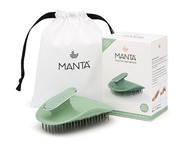 Manta healthy hair brush with its packaging and a drawstring bag, designed for gentle detangling and promoting healthier hair.